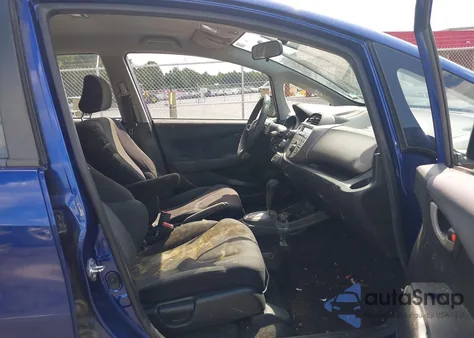 2009 Honda Fit Sport from USA, damaged, VIN JHMGE884X9C007022